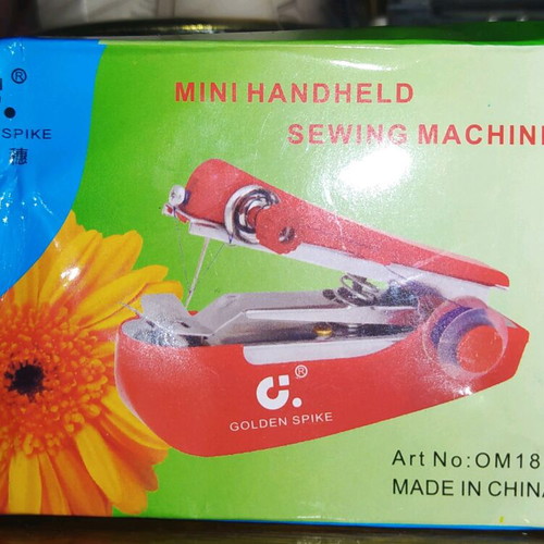 Mini handheld sewing machine new in packaging