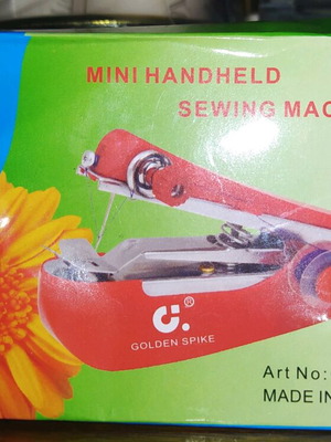 Mini handheld sewing machine new in packaging