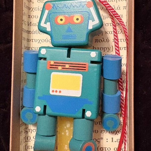 Easter candle with wooden robot figure new