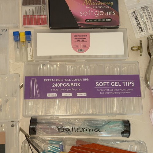 Nail products set like new with dual forms, tips, and accessories
