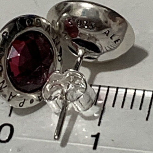 Pandora silver earrings with red stones like new
