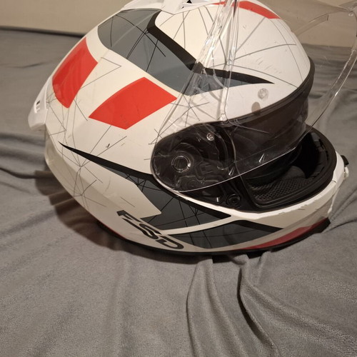 Motorcycle helmet with visor, used