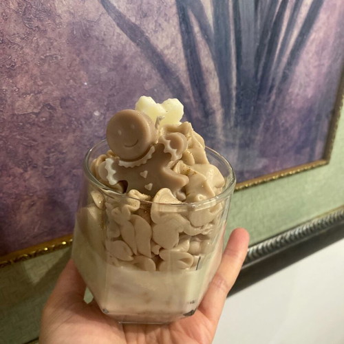 Christmas soy candle with melomakarono scent in glass cup and wax melts