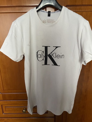 Calvin Klein men's t-shirt used, size M, with stain