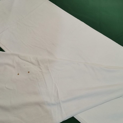 Woven cotton bed sheet used, 1940s vintage with stain