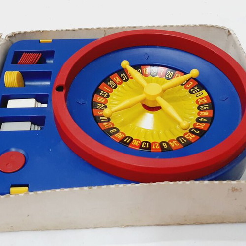 Vintage children's roulette game, like new, blue plastic, nylon mat