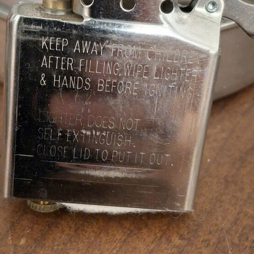 Zippo lighter with skull tattoo design 2004