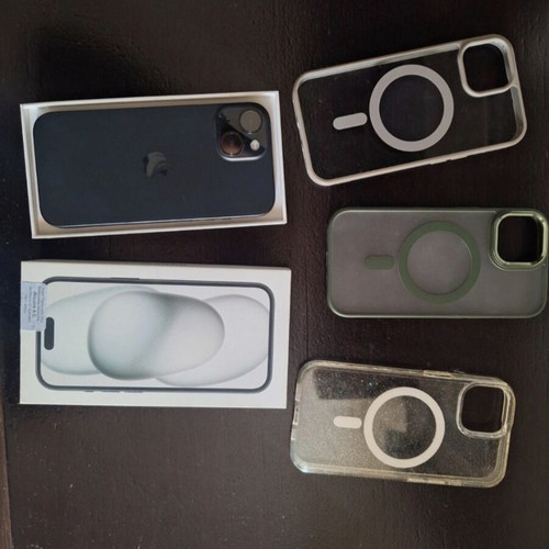 iPhone 15 black like new with 3 cases