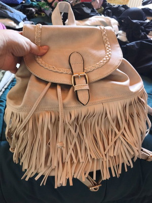 Backpack like new beige with fringe