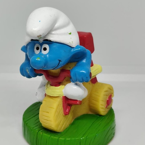 Smurf collectible figure on bicycle handmade Peyo like new