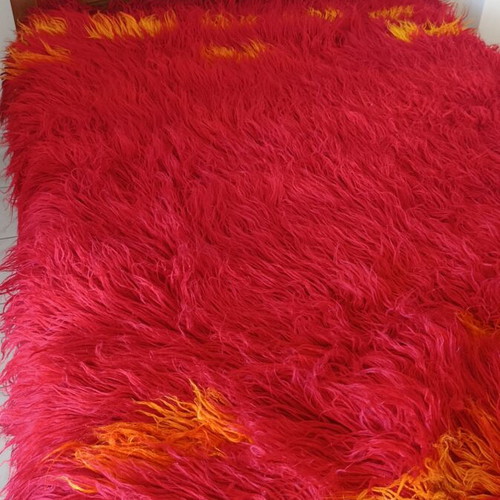 Long pile bed cover blanket, red with orange details