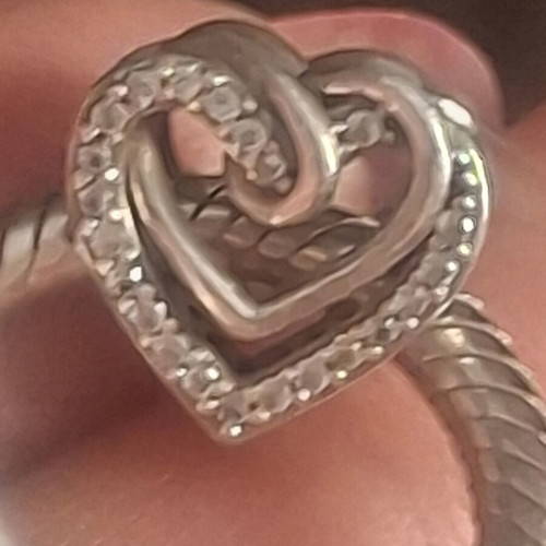 Pandora charm heart with linked hearts decorated with zircon stones, like new