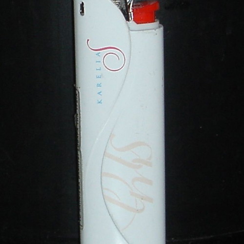 Karelias collectible lighter with metal case, unopened