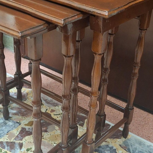 Set of three vintage wooden nesting tables, dark honey color