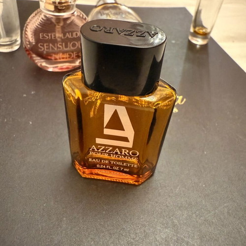 Collection of 11 authentic miniature perfumes like new