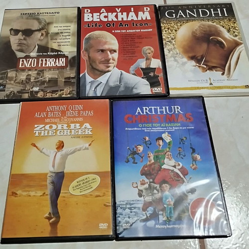 Set of 5 DVDs like new, biographies, movies, kids