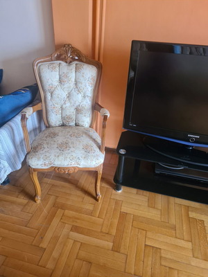 Vintage living room set used with sofa, armchair, and table