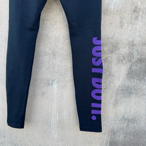 Nike legging used with knee defect, black and purple, size S