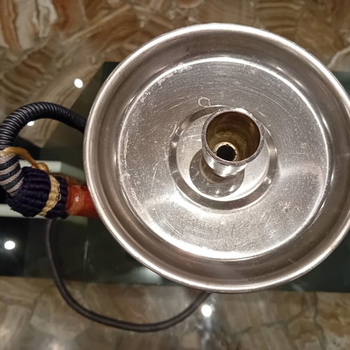Hookah used with traditional Egyptian metal design and glass base