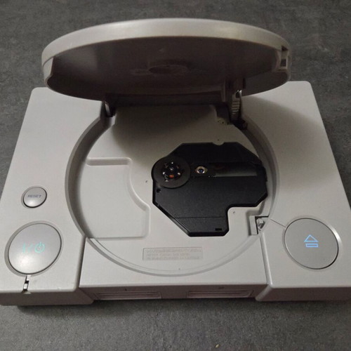 Sony PlayStation SCPH-7502 PS1 console used with Dualshock controller