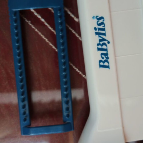 Hair straightener with water spray