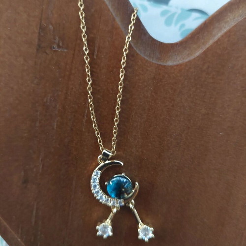Steel necklace with moon and turquoise stone new, gold color