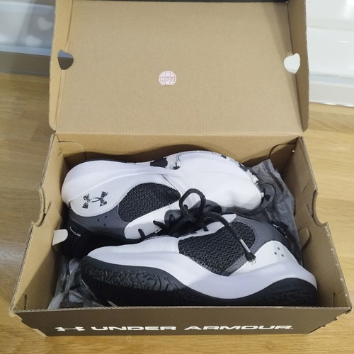 Under Armour basketball shoes kids size 32, black and white