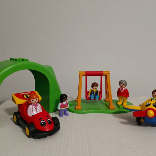 Playmobil set used with swing, airplane, formula car, bench