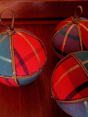 Set of handmade Christmas ornaments with three large plaid balls