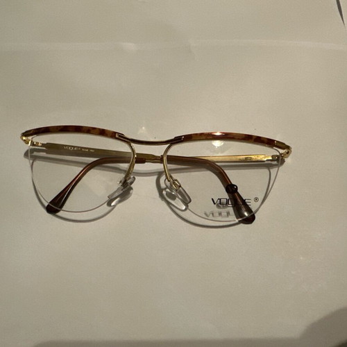 Oval Vogue optical glasses with tortoise details and gold frame, new