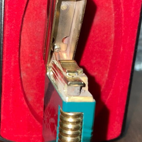 Yves Saint Laurent YSL vintage gold blue gas lighter with marbled finish and box used