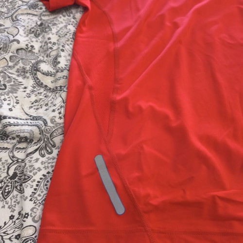 Puma men's technical sports t-shirt size M, like new, red with reflective details
