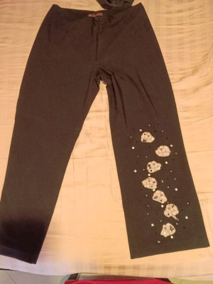 Pants with lace and sequin design on leg, like new, size 44-46