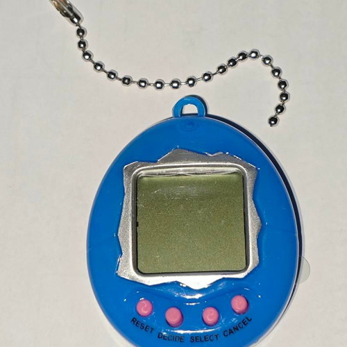 Electronic Digital Retro Virtual Pet Game like new