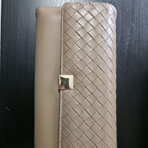 Wallet used beige with small signs of wear