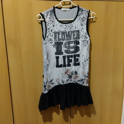 Children's sleeveless dress with pleated hem like new