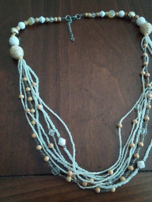 Handmade necklace used with calcite, shells and wooden elements