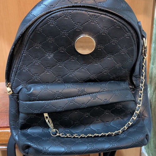 Women's black backpack with gold details like new