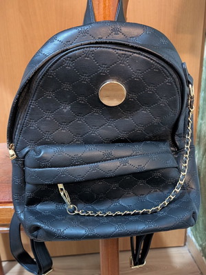 Women's black backpack with gold details like new
