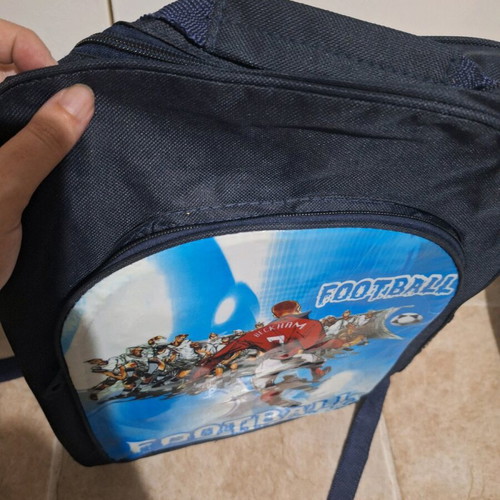 School bag football with central and side compartments