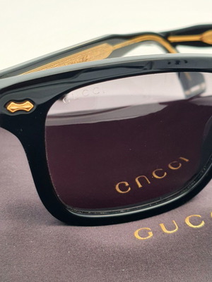 Gucci GG0735S/001 sunglasses like new, black and gold
