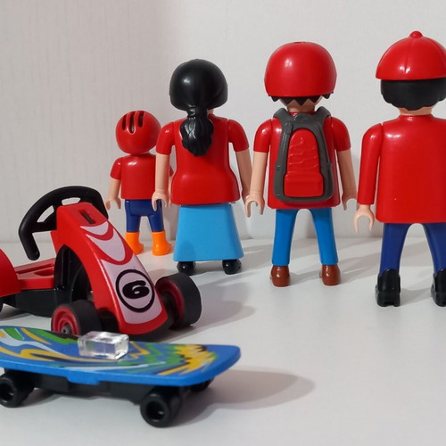 Playmobil family figures set used, 4 pieces with kart and skateboard