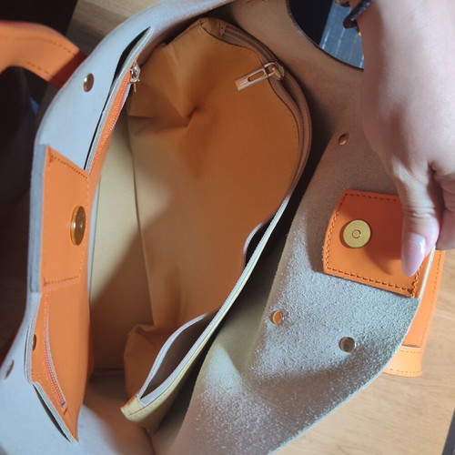 Leather handbag used, orange with multiple compartments
