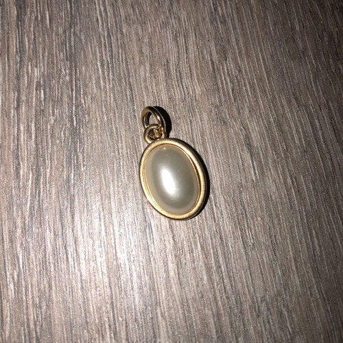 Women's pendant like new, gold-plated steel without chain