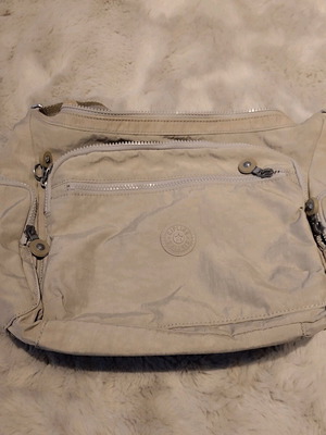 Kipling crossbody bag beige like new with multiple pockets