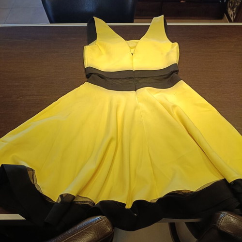 Cocktail dress with transparency at the waist like new, size M