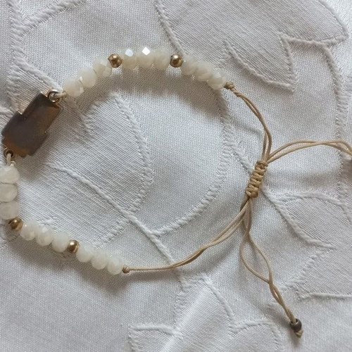 Bracelet with white beads and cross, like new, gold and beige details