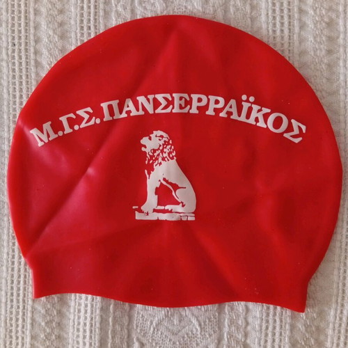 Swimming cap like new with M.G.S. Panserraikos logo