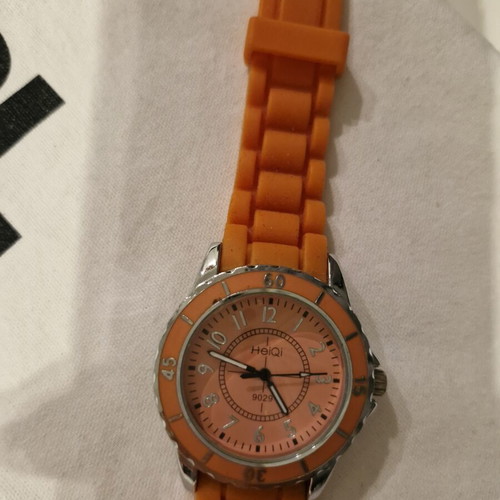 Watch with bright orange silicone strap and dial like new
