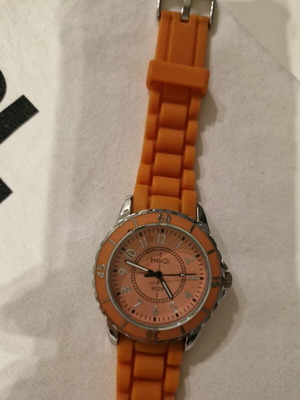 Watch with bright orange silicone strap and dial like new